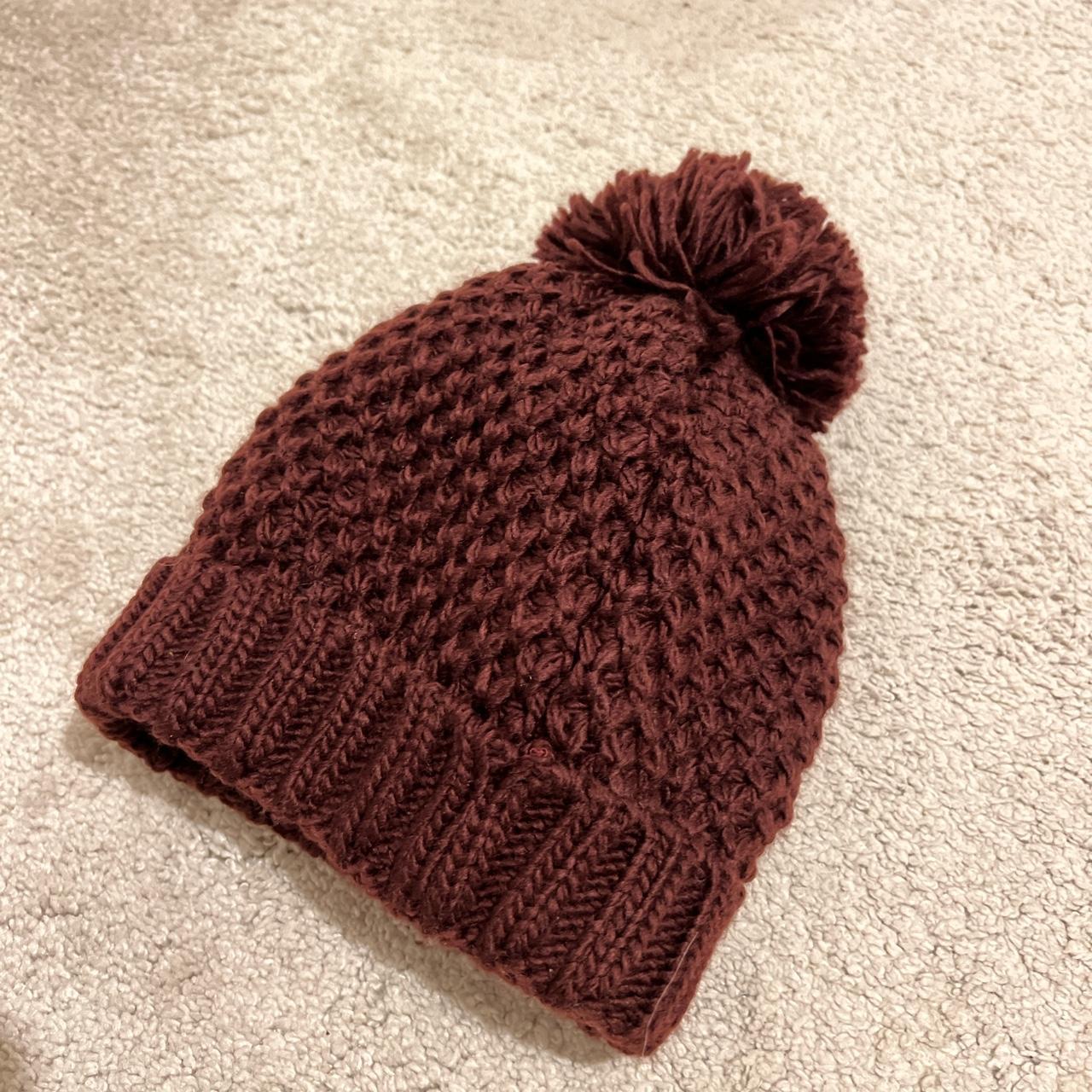 Burgundy bobble hat Never worn INT10 - Depop