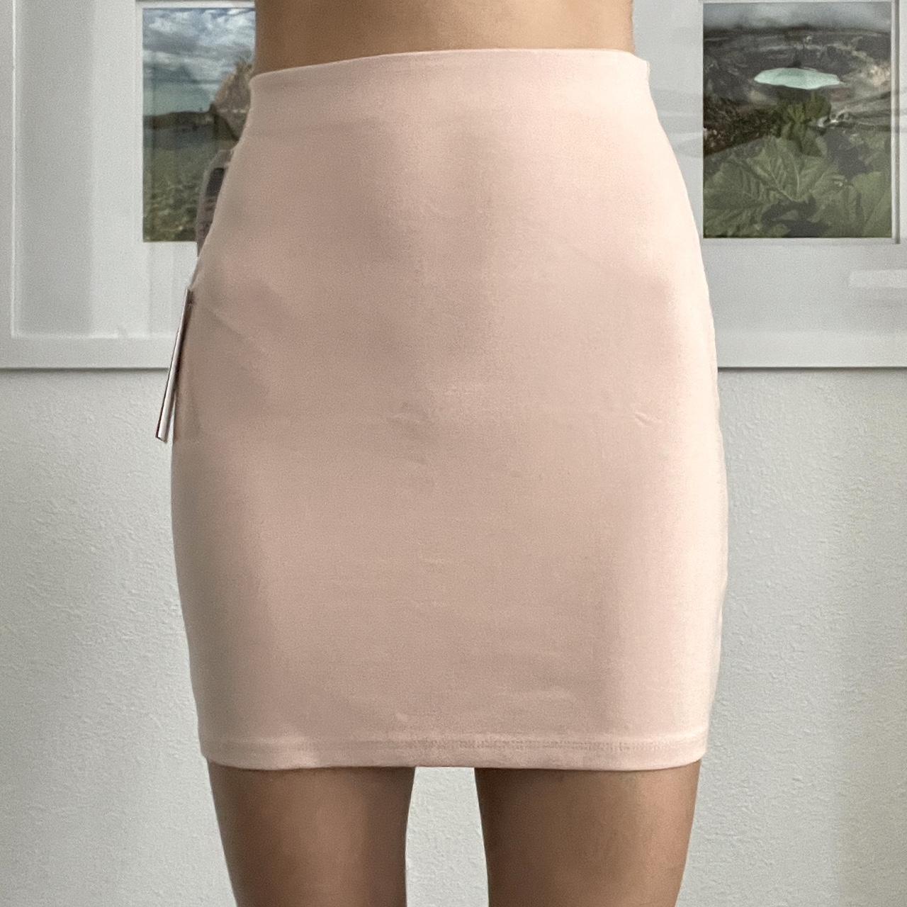 Aritzia Sunday Best pale pink mini skirt. Fits like