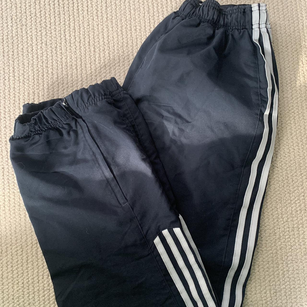 Adidas tracksuit bottoms, waterproof style material.... Depop