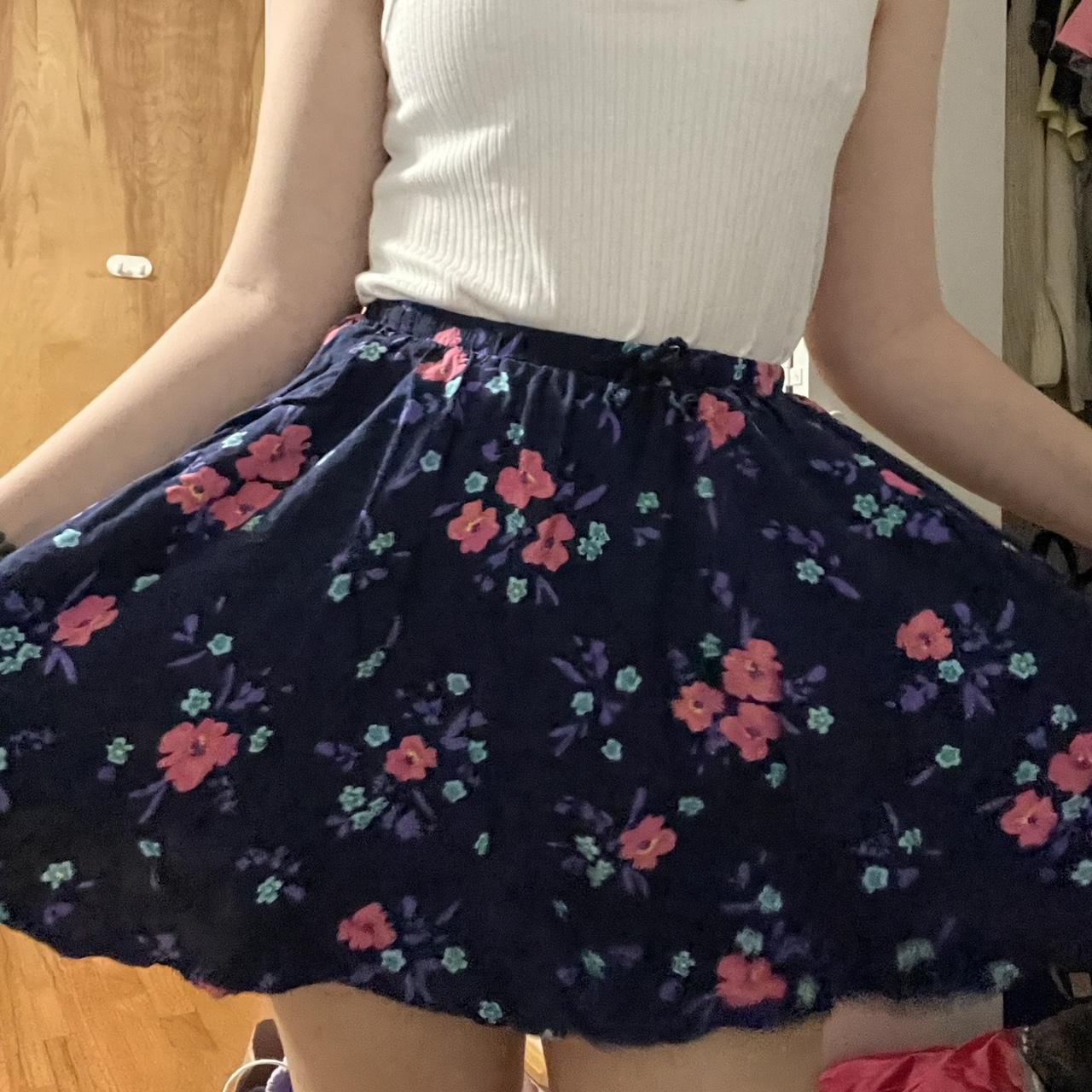 Navy blue shop skirt pink flowers