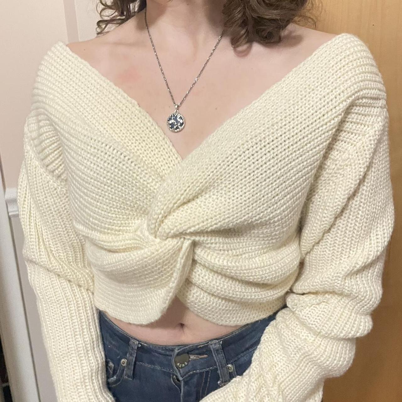 beige knitted sweater, cute tie in the middle , can be...