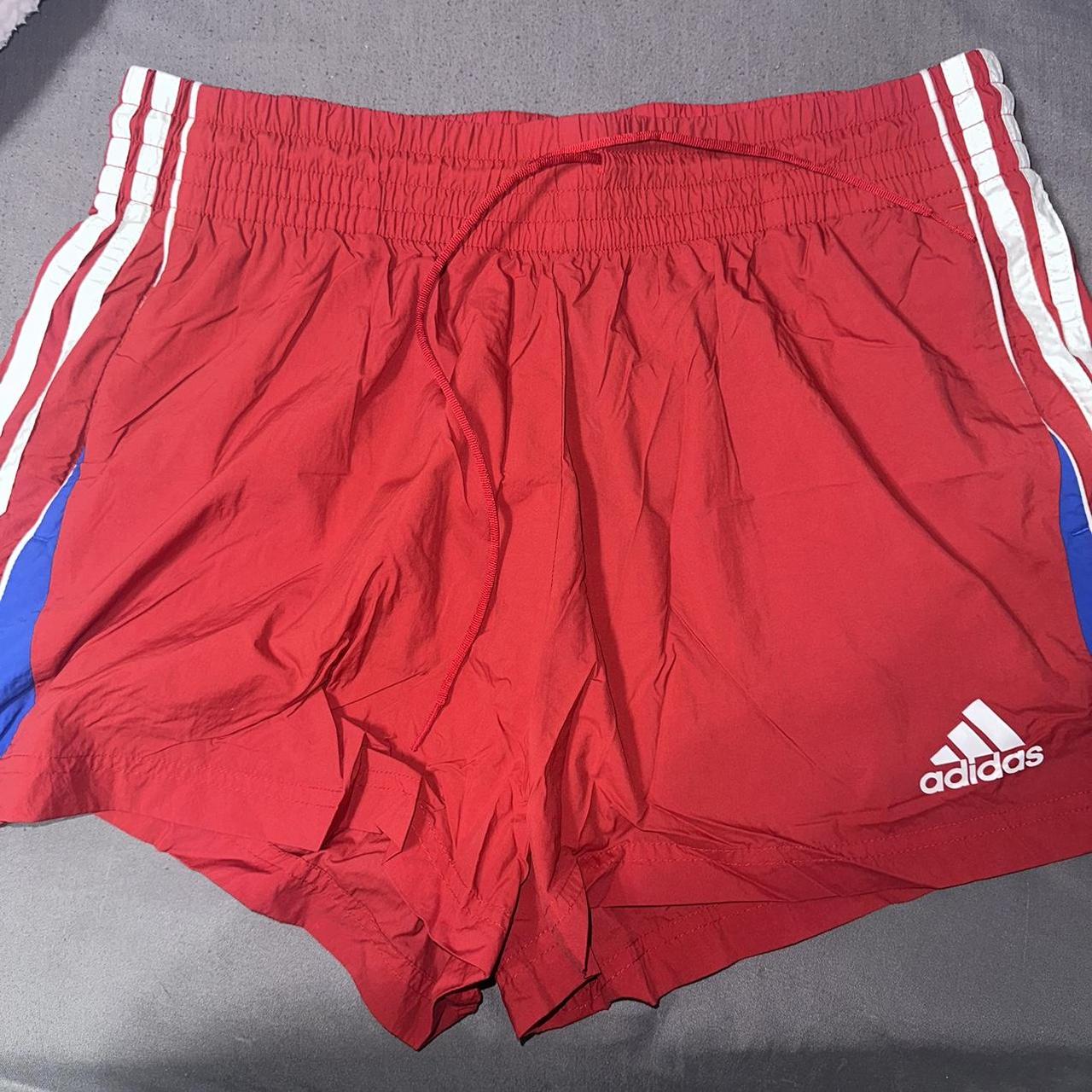 Adidas red shorts Women’s large In good condition... - Depop