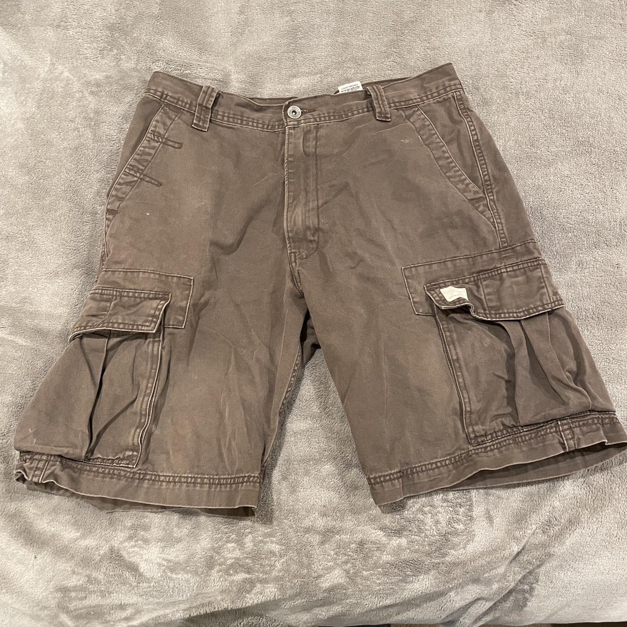 Vintage levis cargo shorts super nice baggy fit,... - Depop