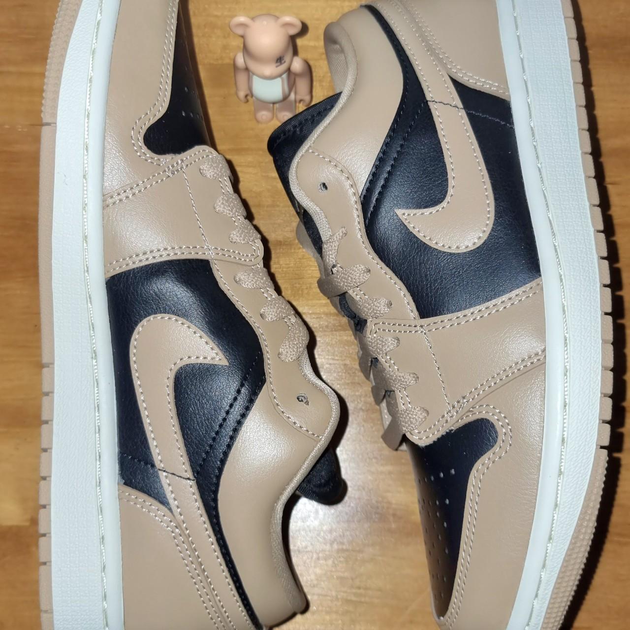 tan and black jordans