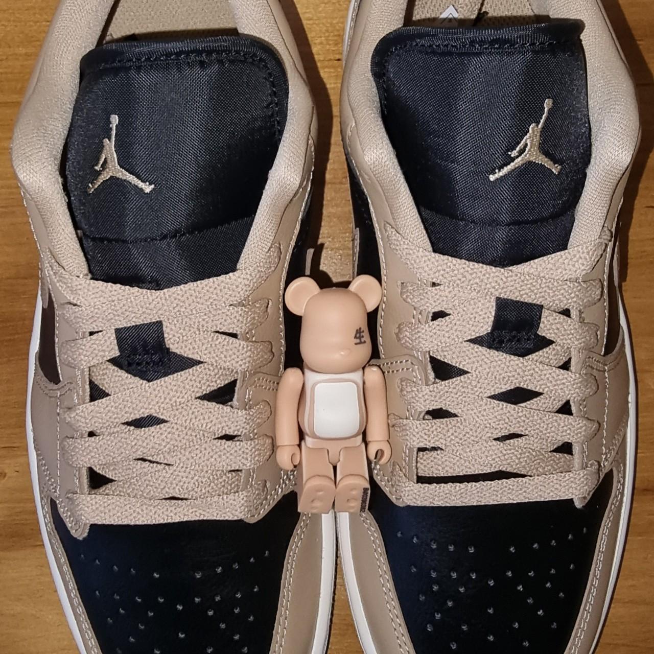 tan and black jordans