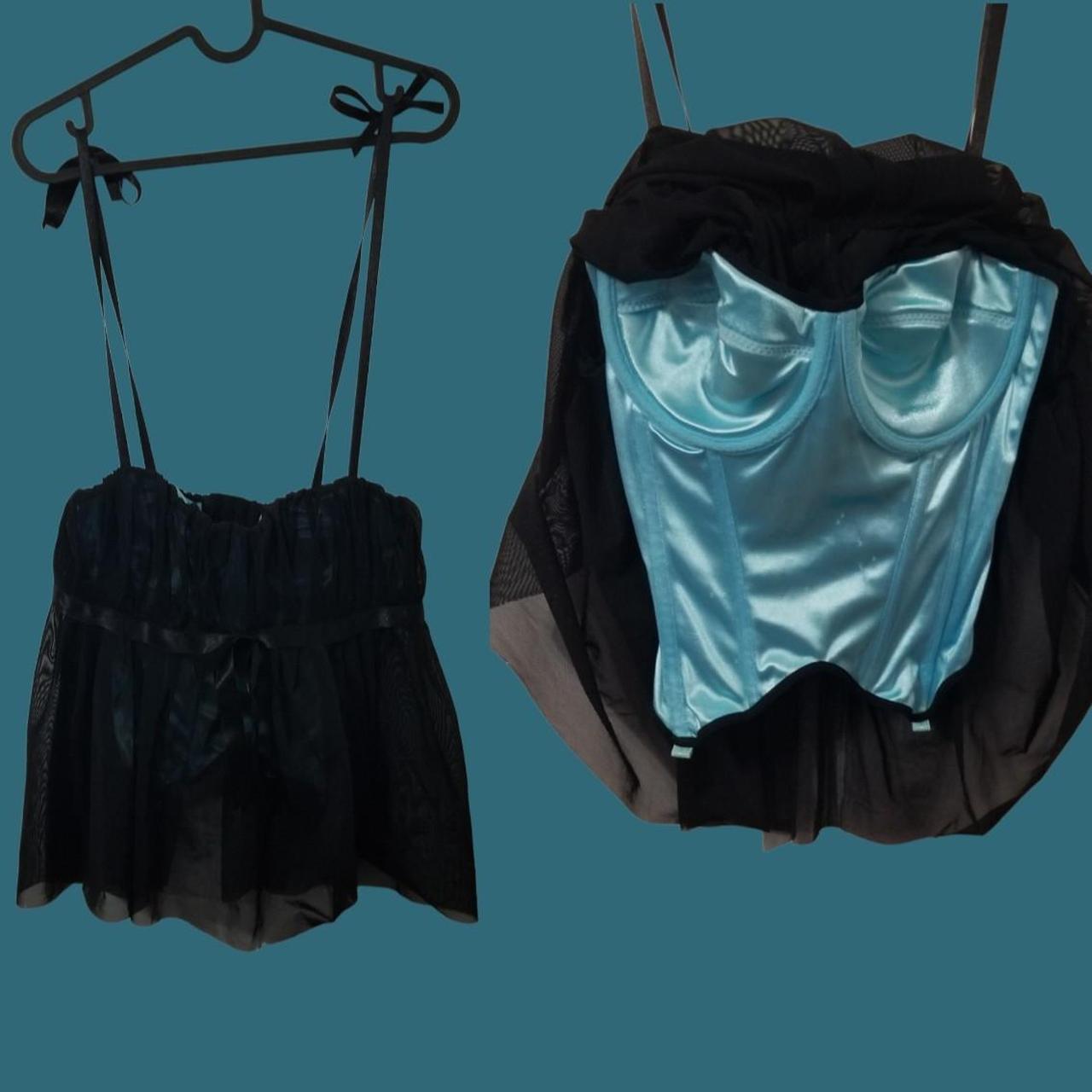 Blue corset top with black mesh on top! Cup size is... Depop