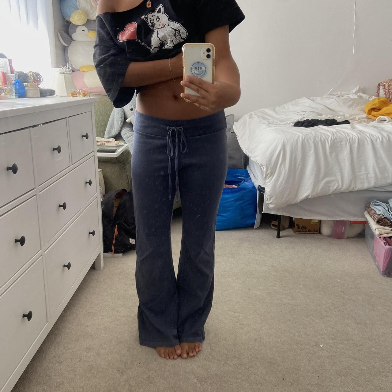 Brandy Melville low rise, flare, navy sweatpants,... Depop