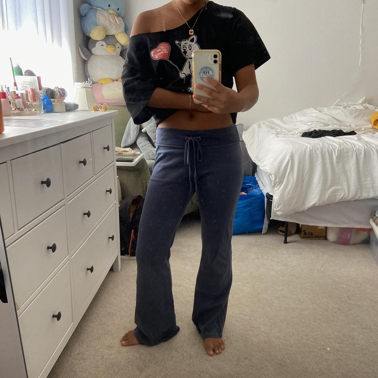 Brandy Melville low rise, flare, navy sweatpants,... Depop