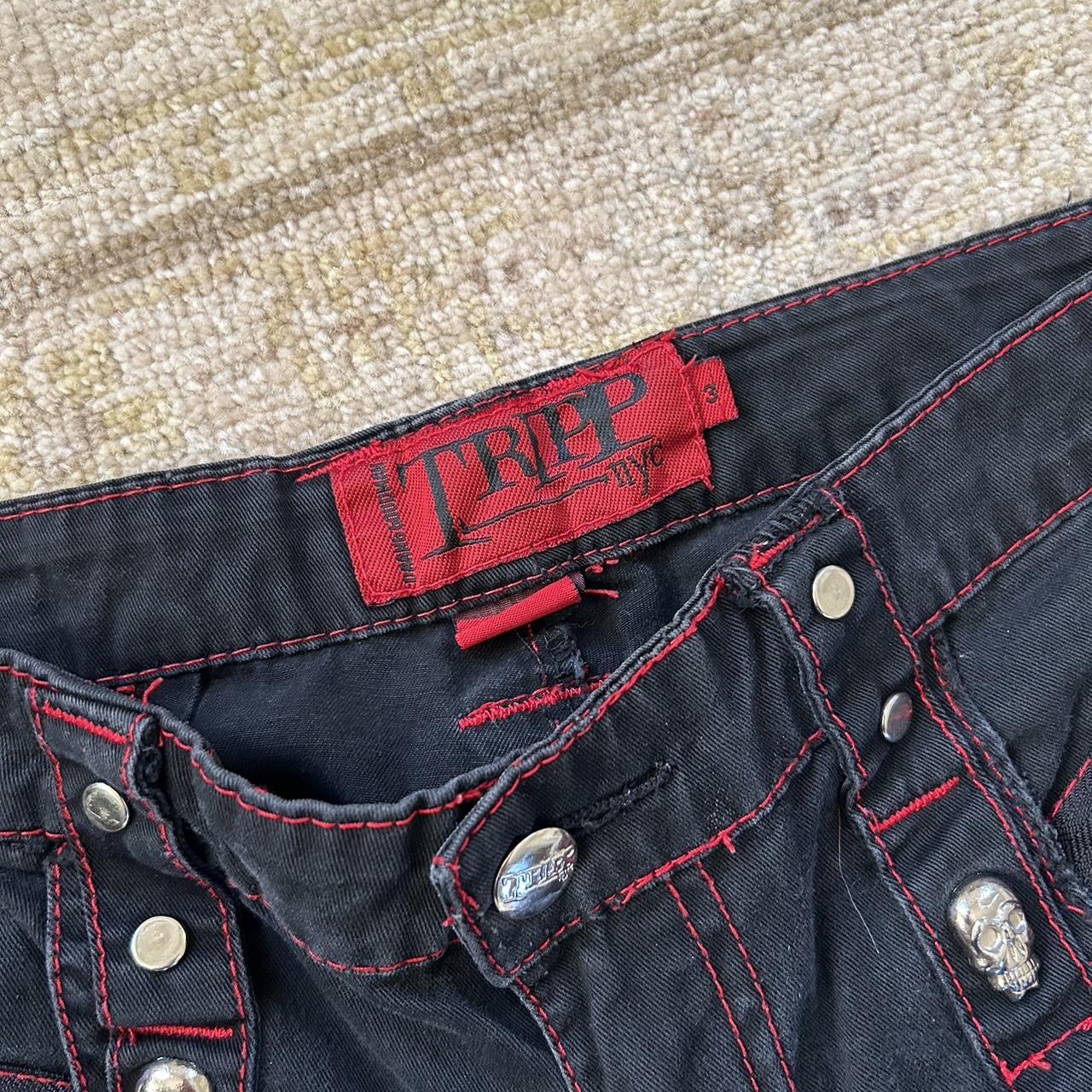 Super rare and unique black and red flared low rise... - Depop