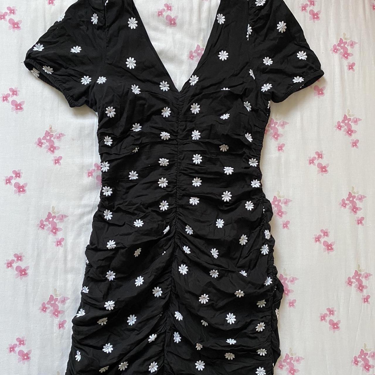 Black puff sleeve mini dress with white floral... - Depop
