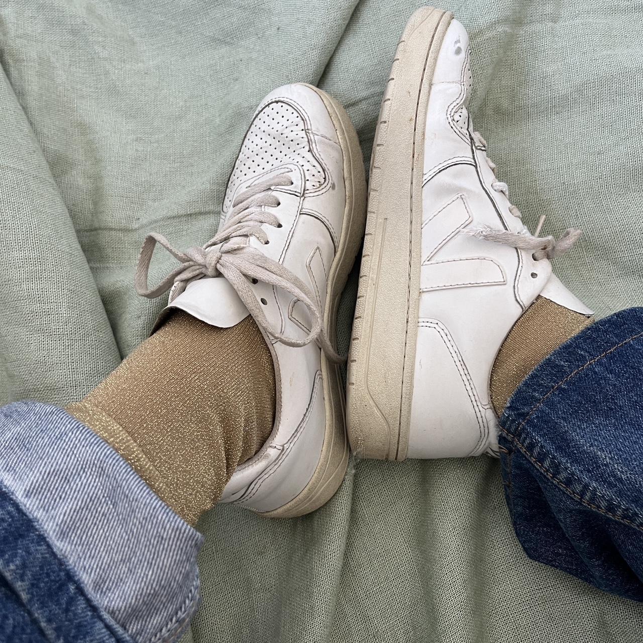 White Veja sneakers. Well loved but the soles are in... - Depop