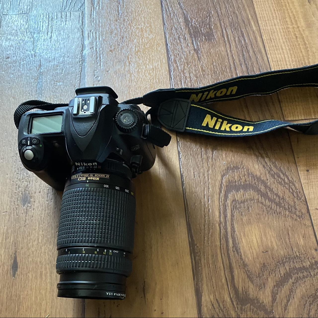 Nikon D50, selling with Nikon strap and Nikon ED AF... - Depop