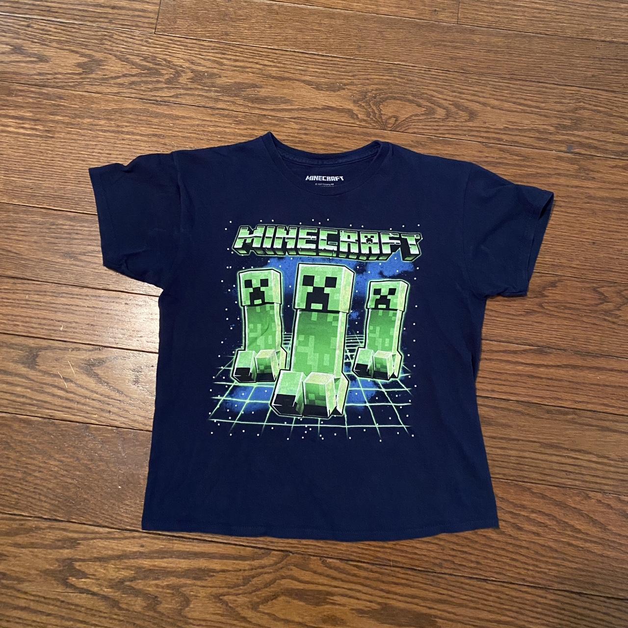 Dark blue minecraft shirt. Youth large but fits as a... - Depop