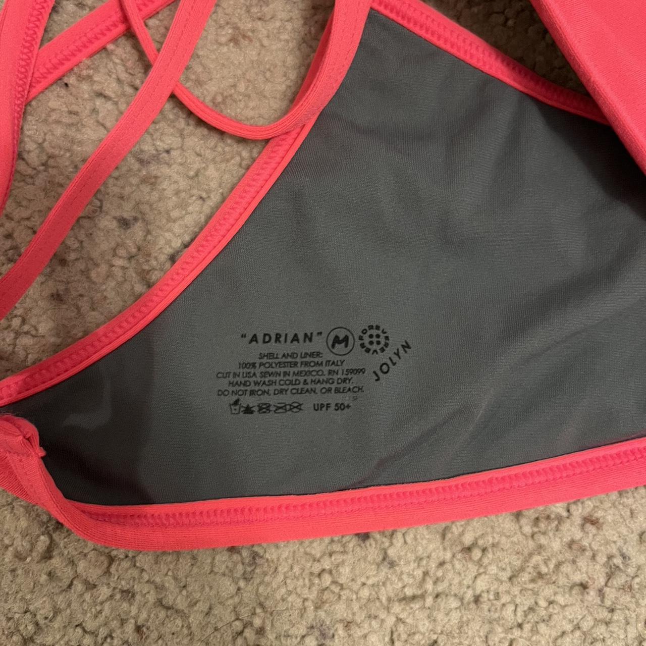 pink jolyn swim top. size medium but fits small. Depop