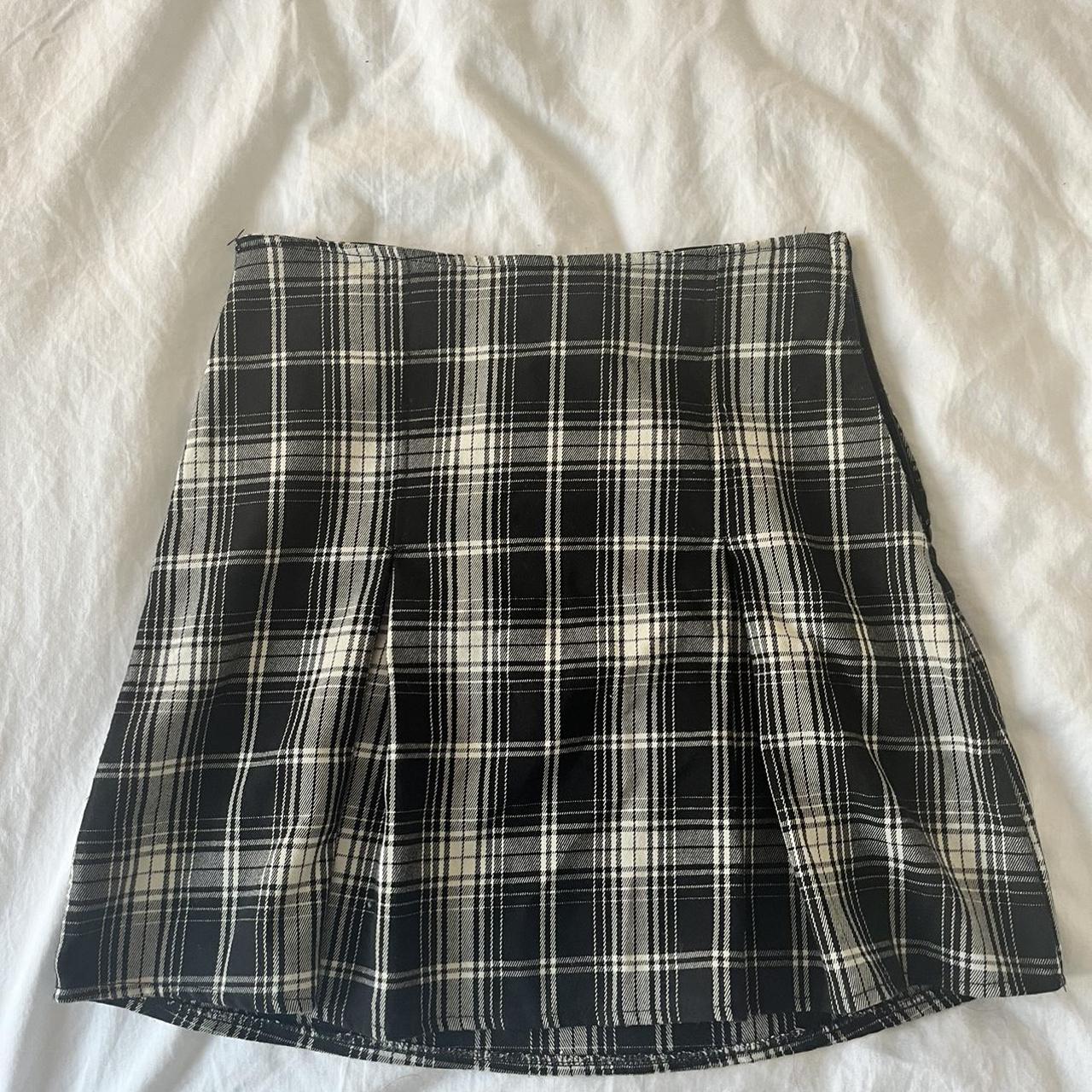 Really cute brandy plaid skirt with two pleats in... - Depop