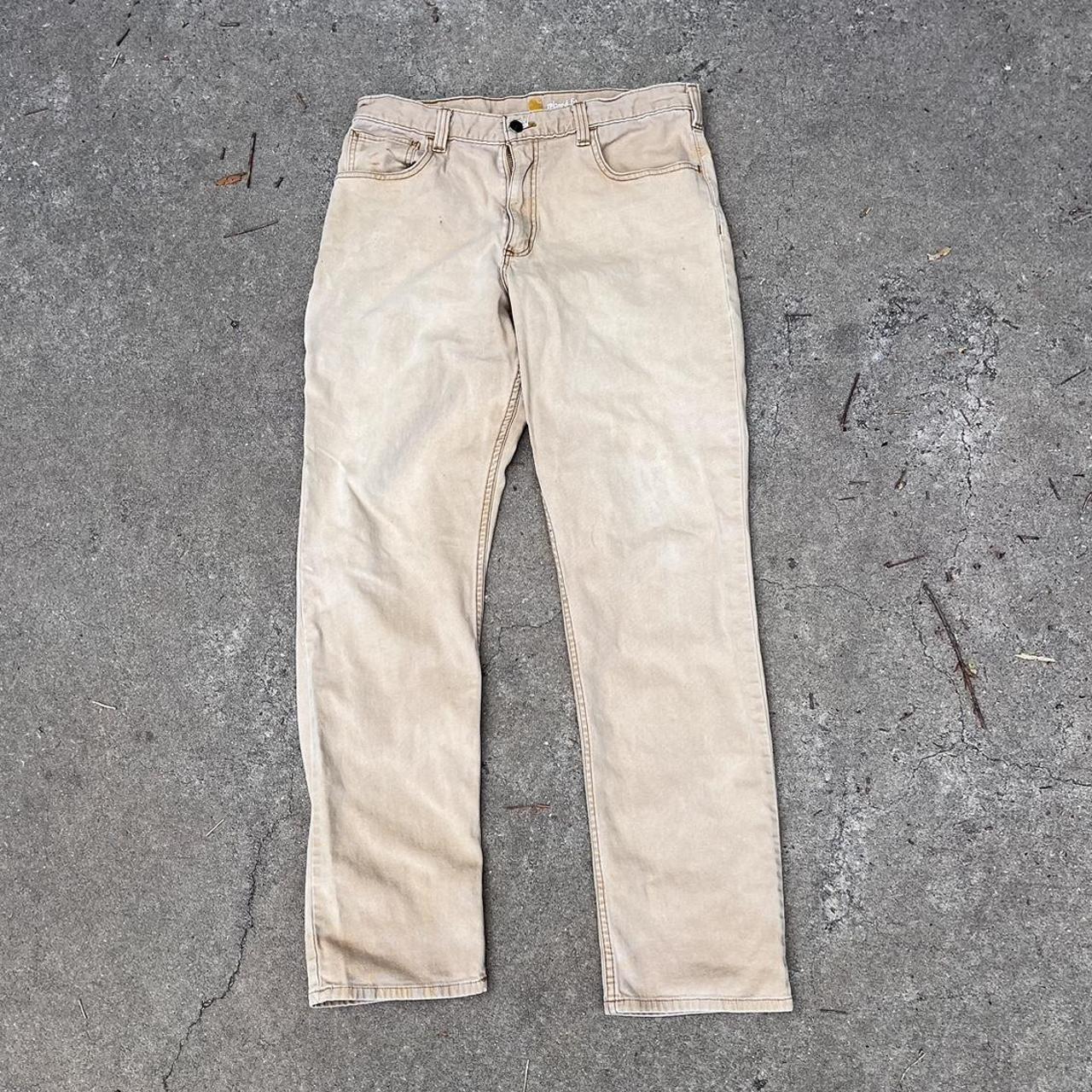 cute modern carhartt tan pants with cell phone... - Depop