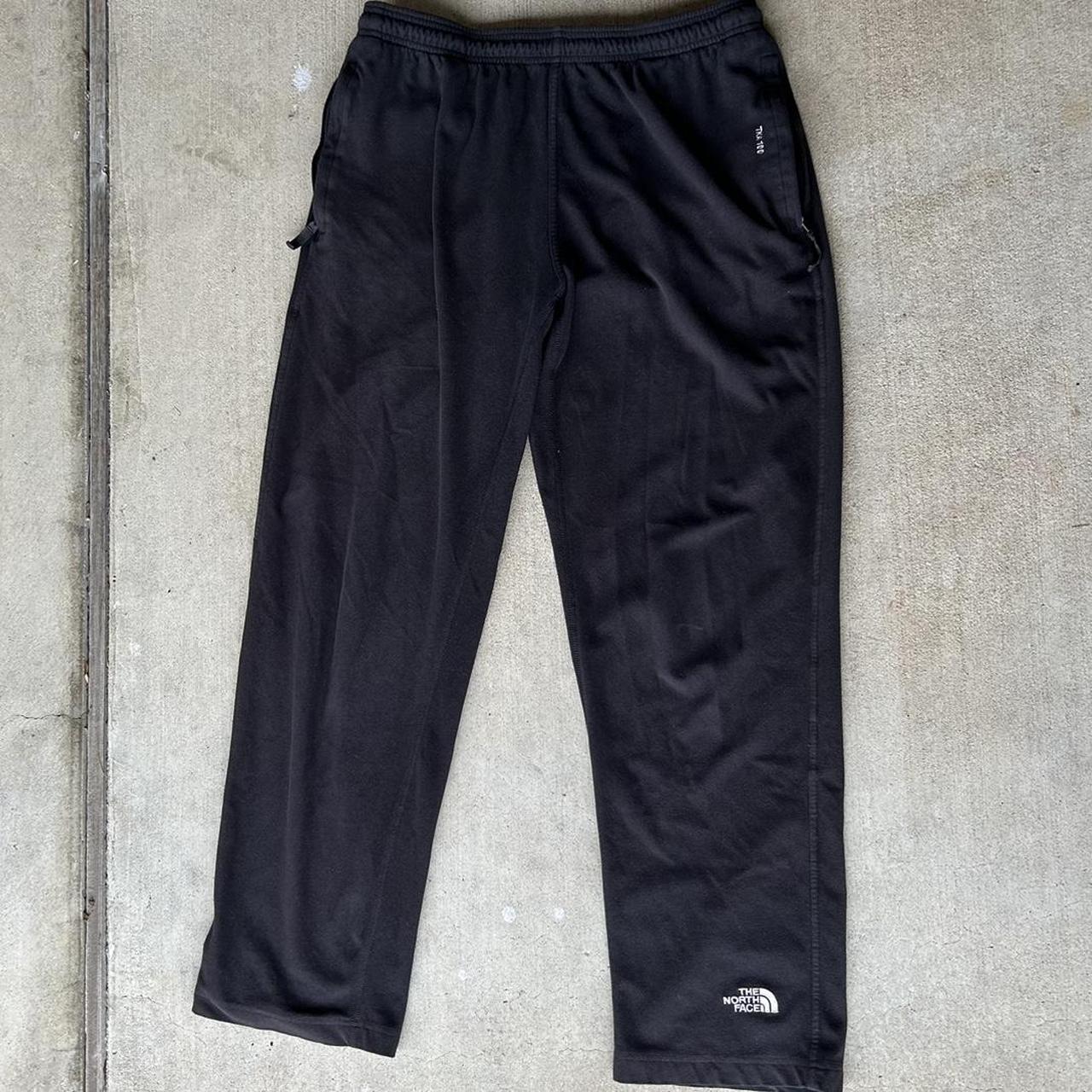 The North Face TKA 100 fleece sweatpants black.... - Depop