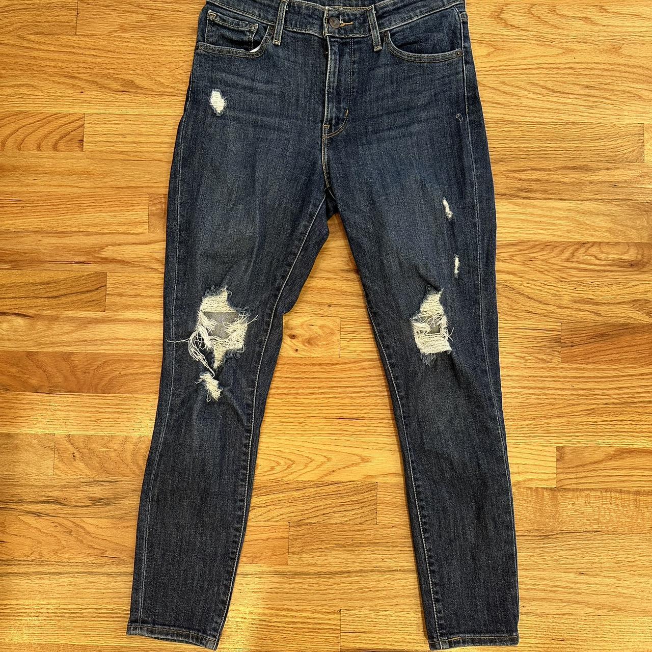 Levi black 2024 distressed jeans