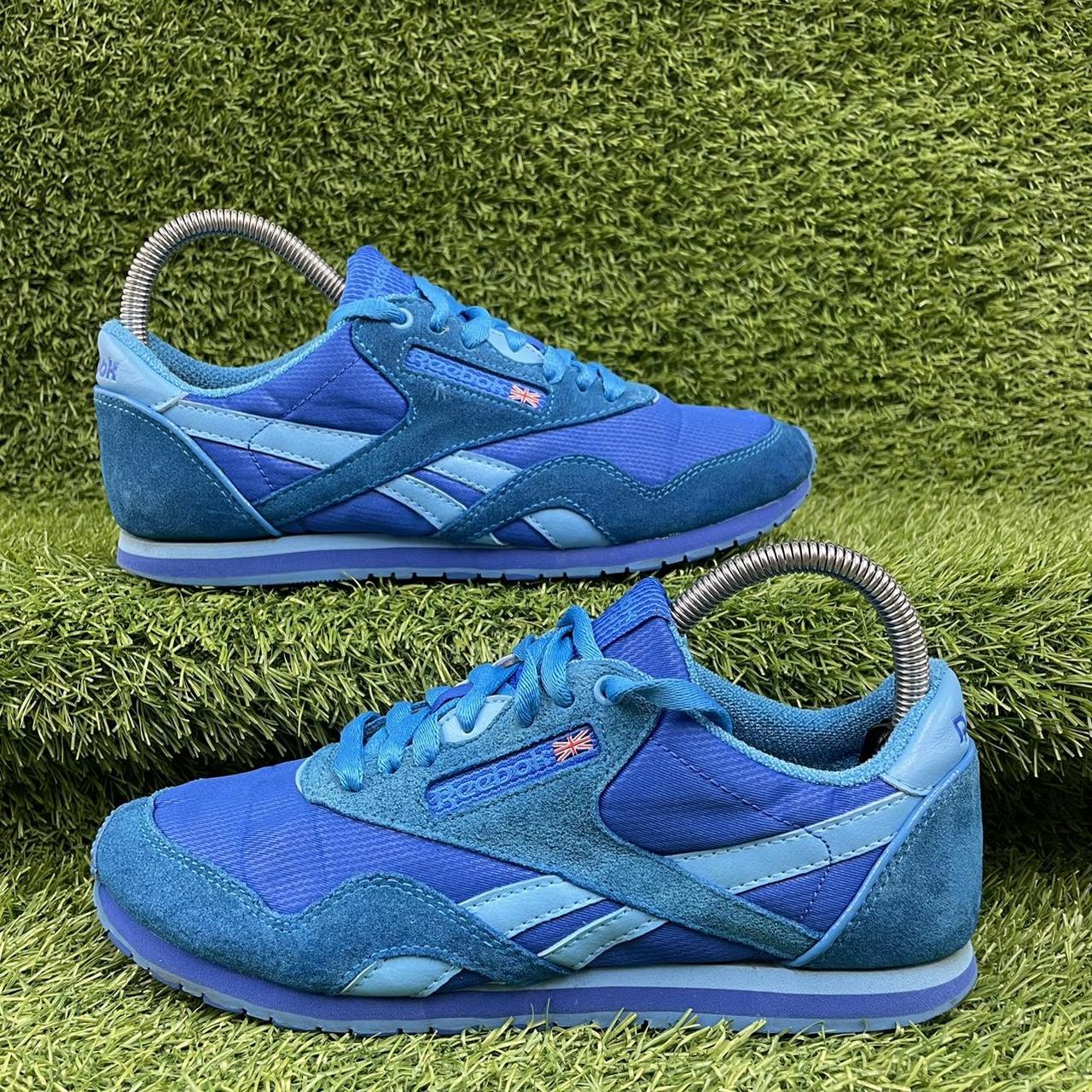 Reebok store blue suede