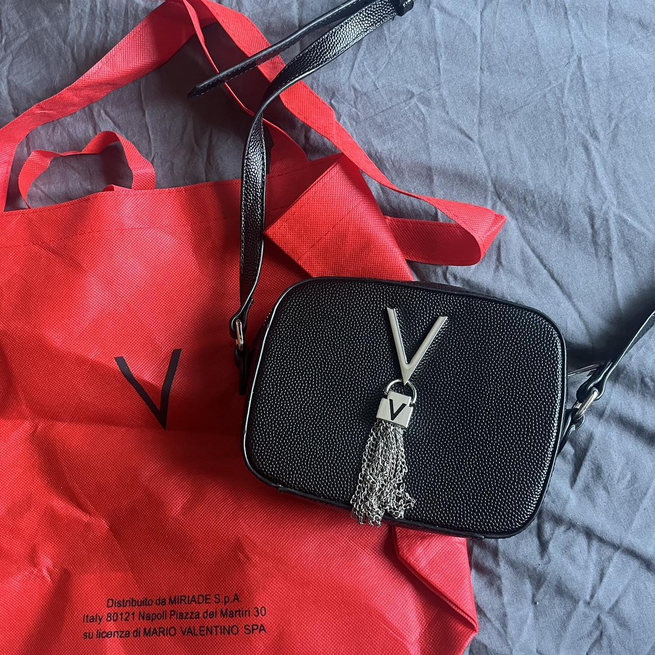 Mario valentino spa online bags