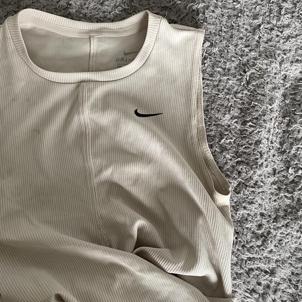 cream nike top