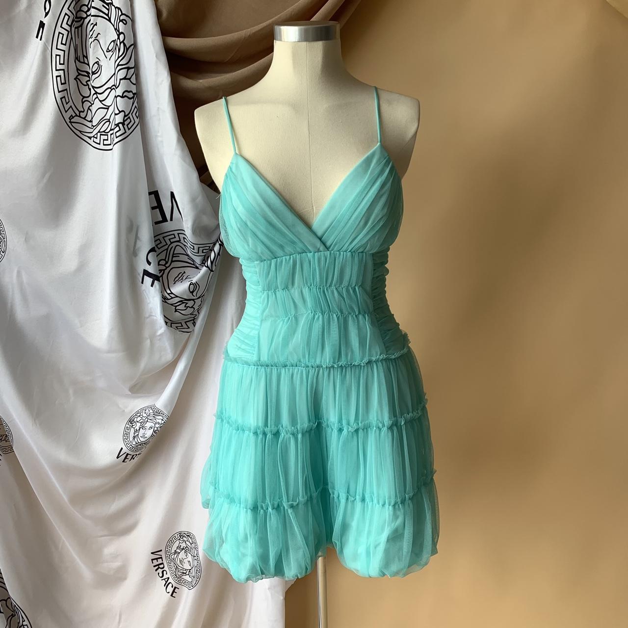 Mint green ruffle dress by Jessica McClintock for... Depop