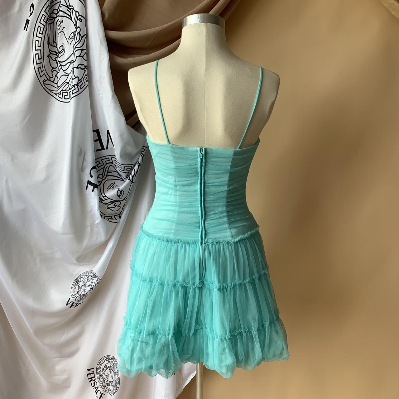 Mint green ruffle dress by Jessica McClintock for... Depop