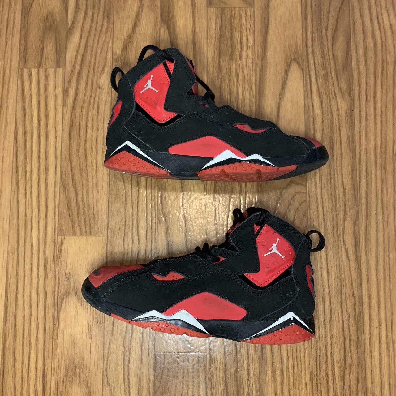red and black jordans true flight