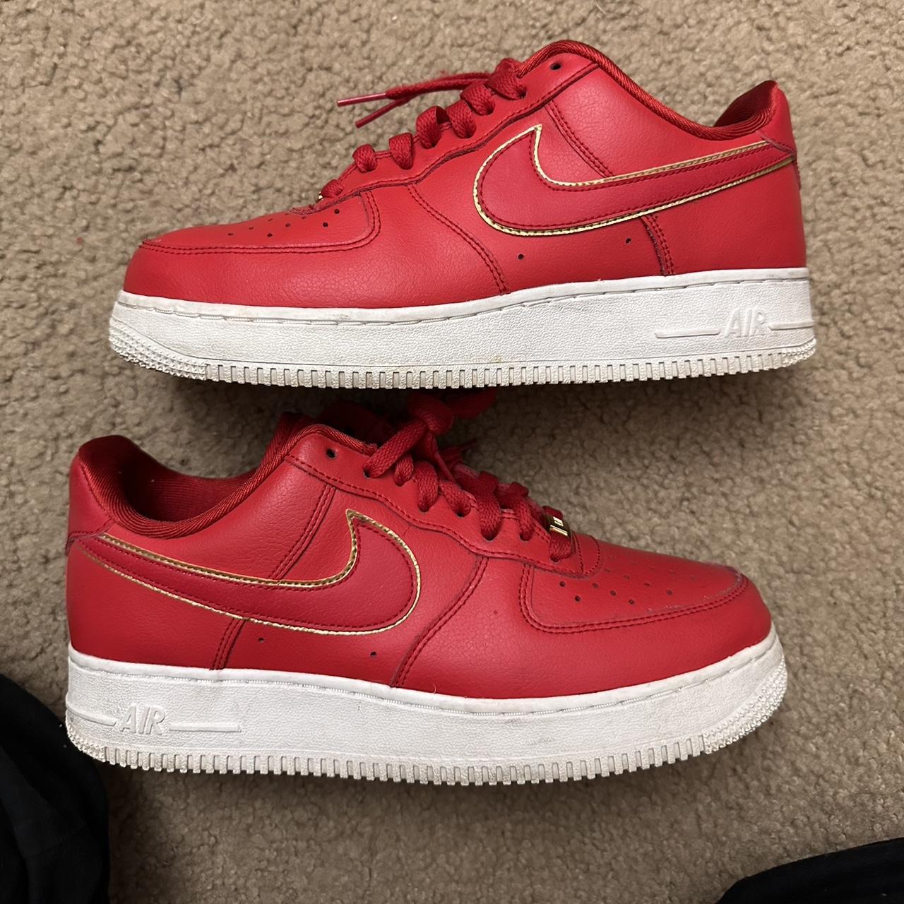 red and gold nike trainers