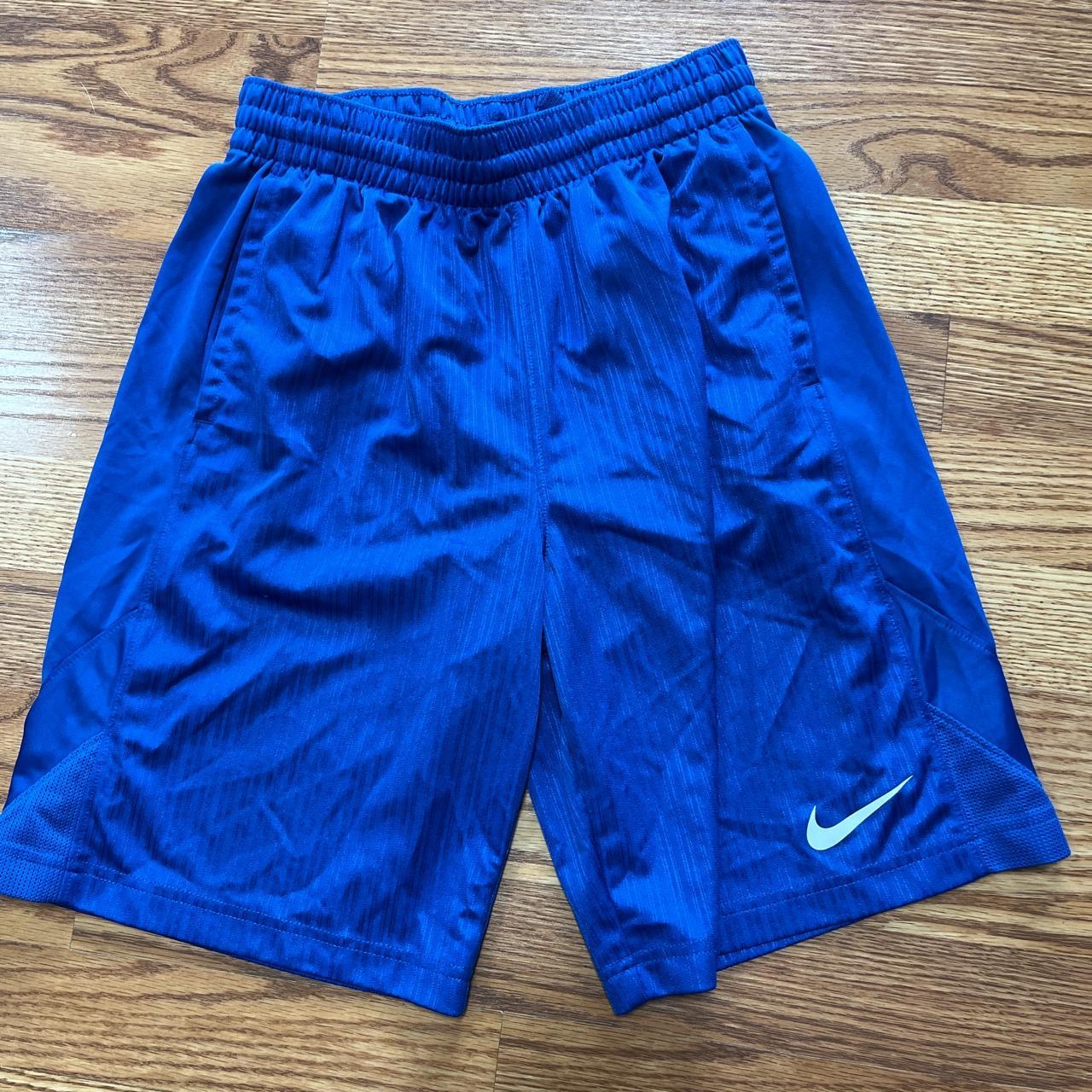 Blue nike kids large shorts - Depop