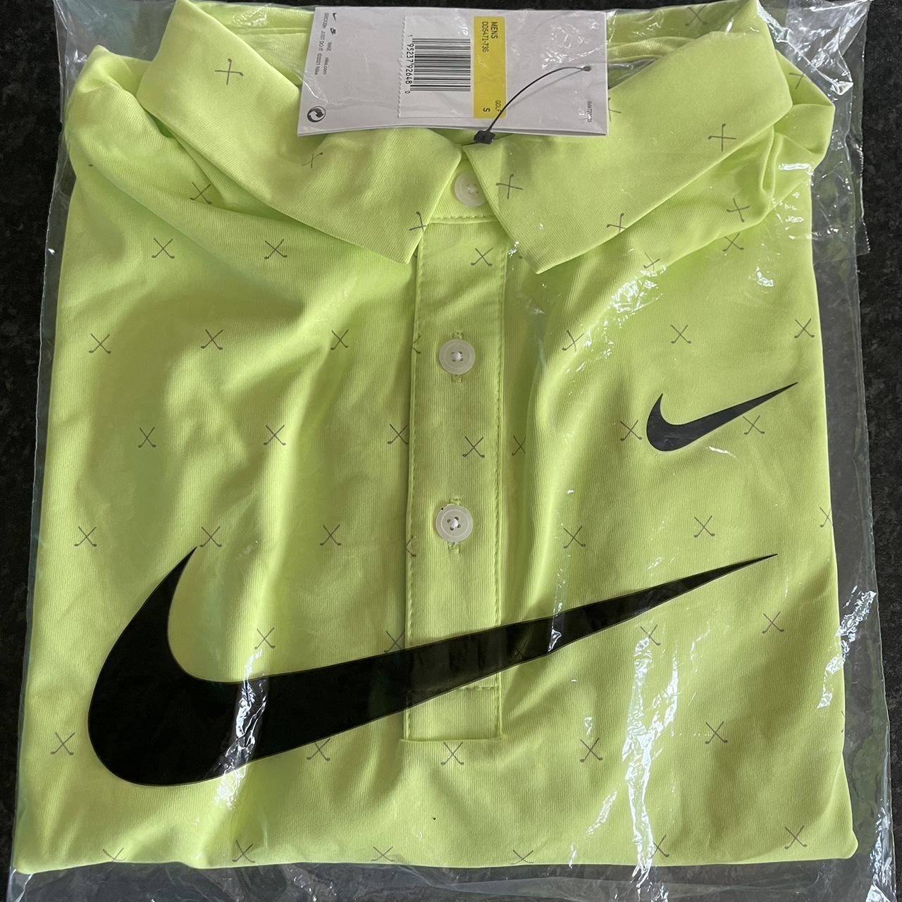 Brand new, unopened Nike Golf yellow polo shirt