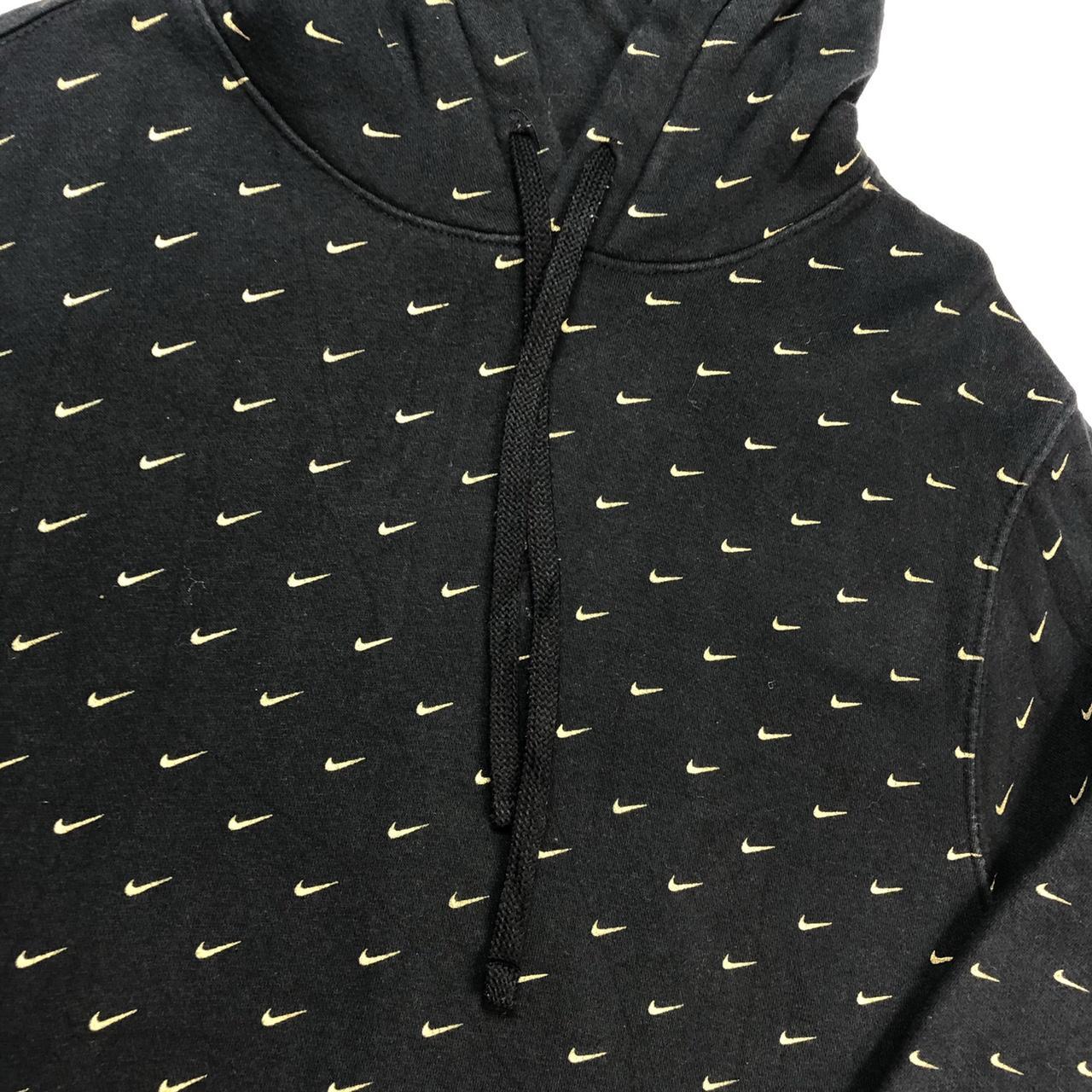 black and gold nike swoosh