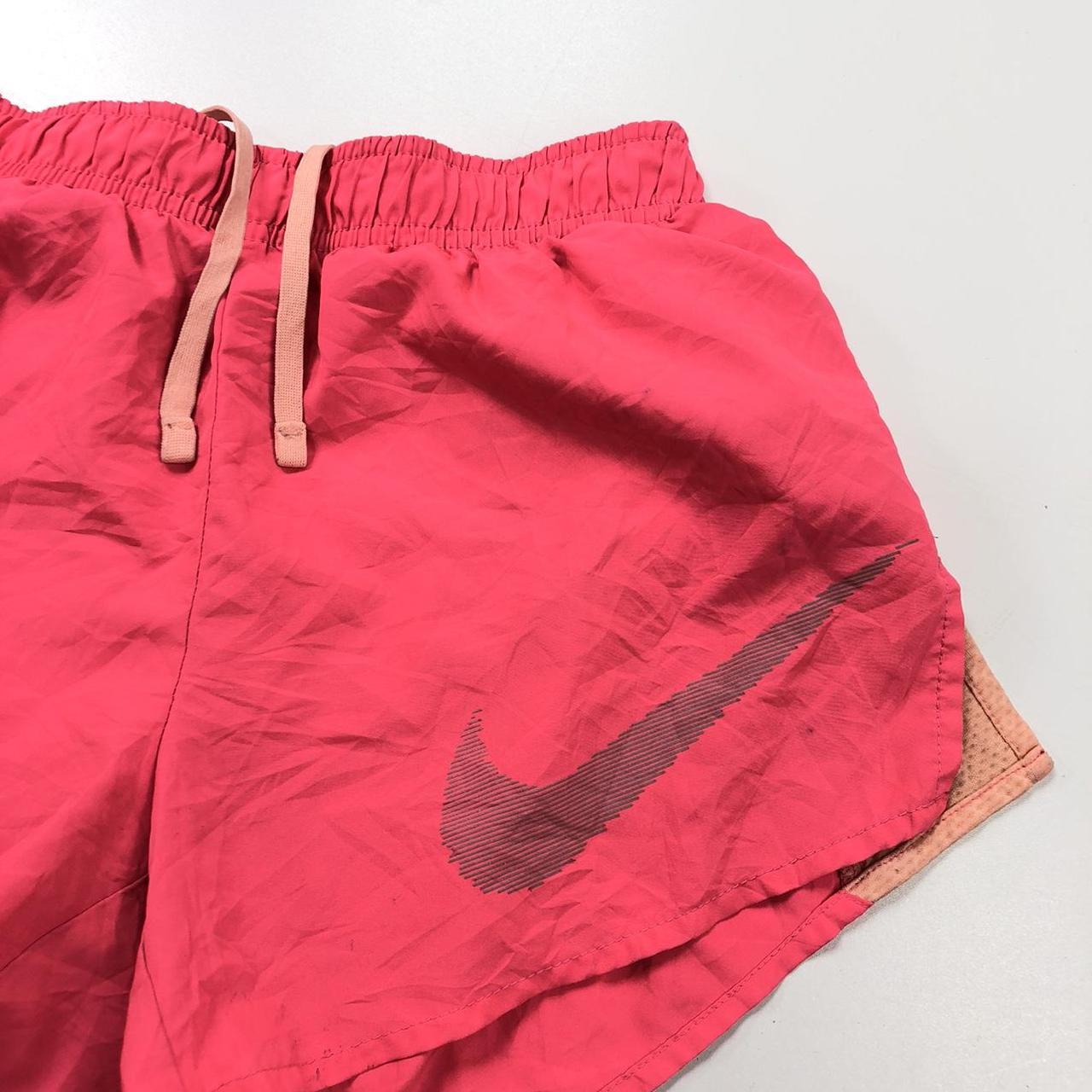 rust pink nike shorts