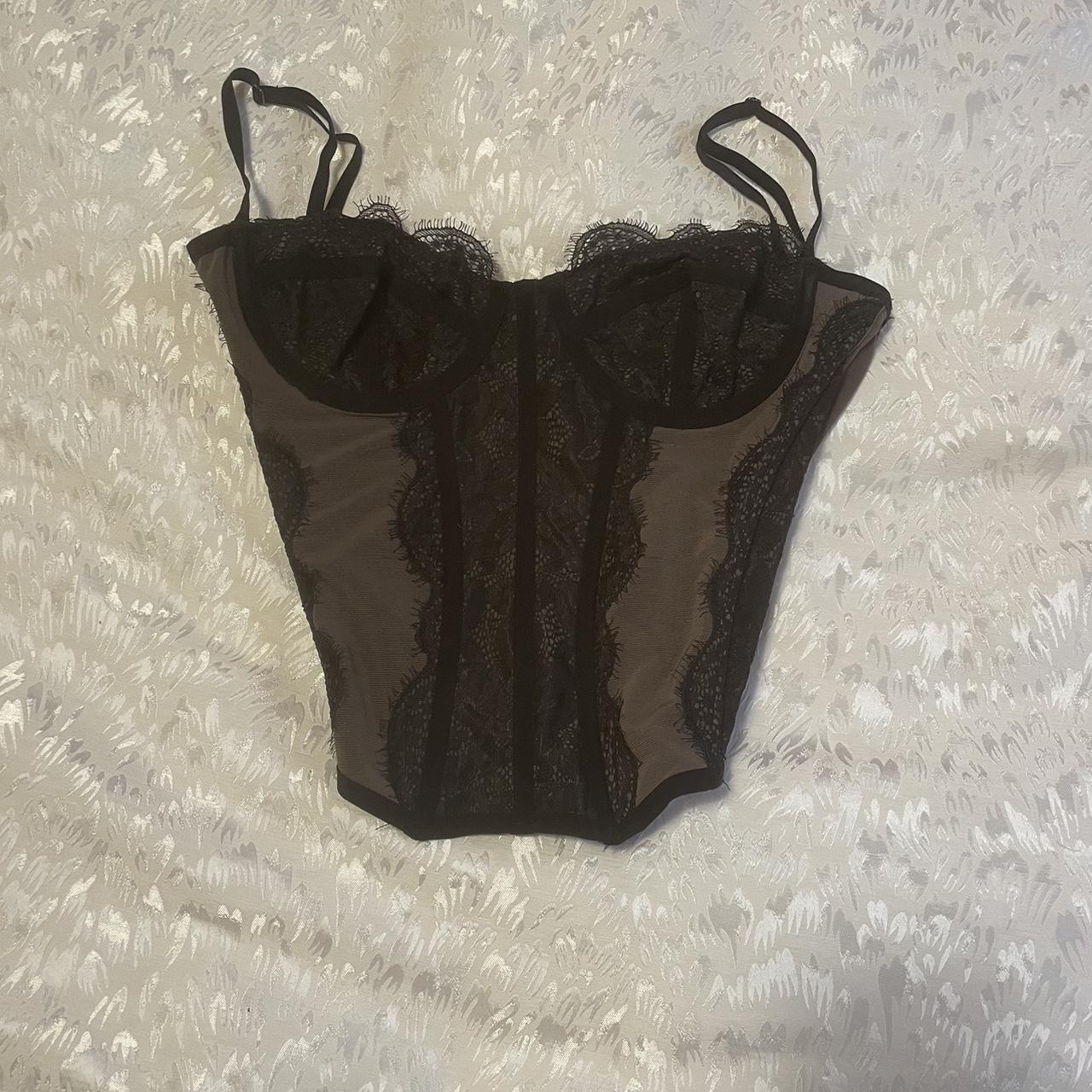 Size medium black/grey urban outfitters corset top.... Depop