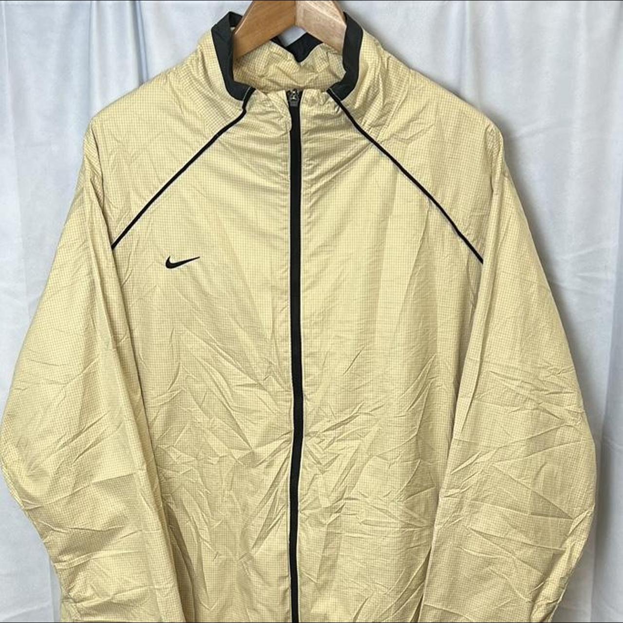 beige nike jacket