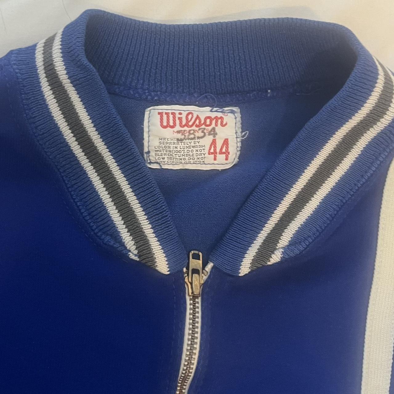 Really cool Wilson varsity pullover Marked a size... - Depop