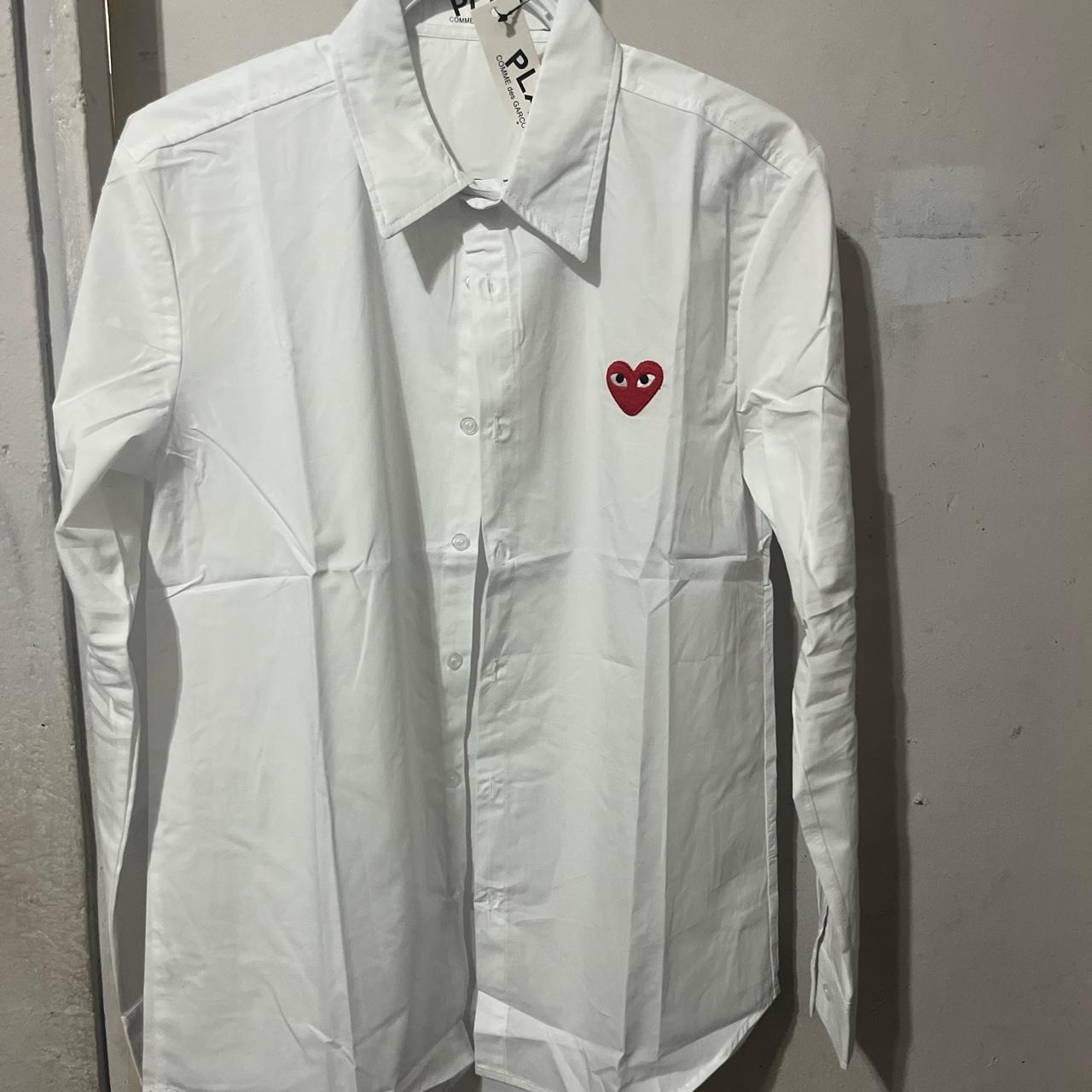 Cdg button hot sale down