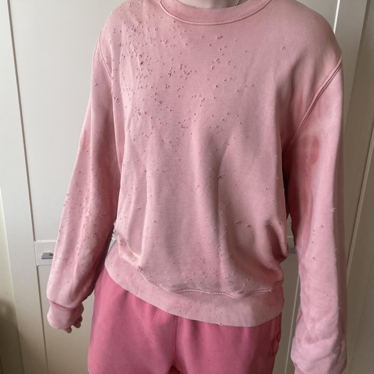 Salmon pink ripped Amiri sweatshirt Depop