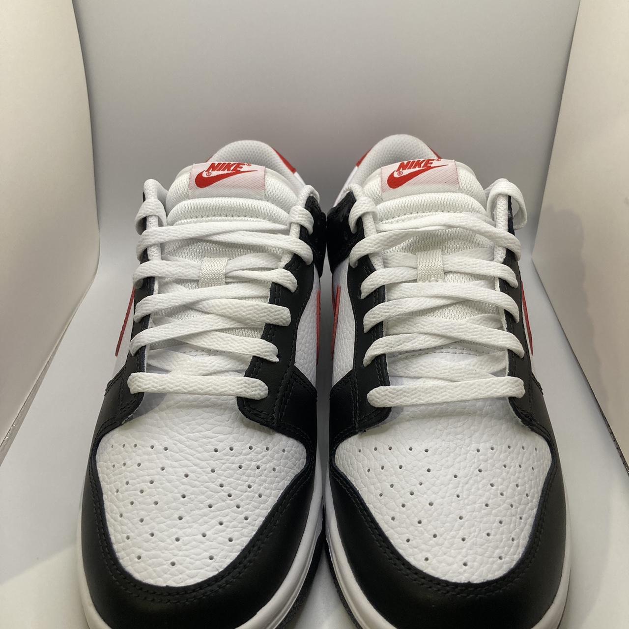 dunk with red toe and brown swoosh