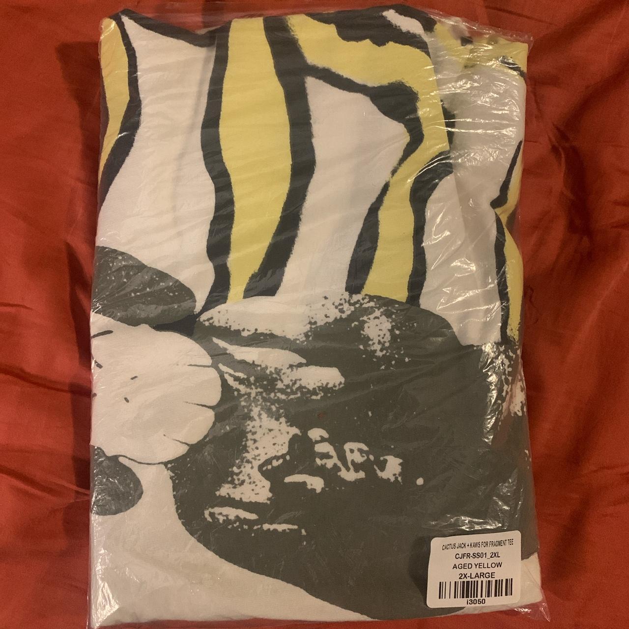 CACTUS JACK x KAWS FOR FRAGMENT AGED YELLOW TEE 2xl.... - Depop