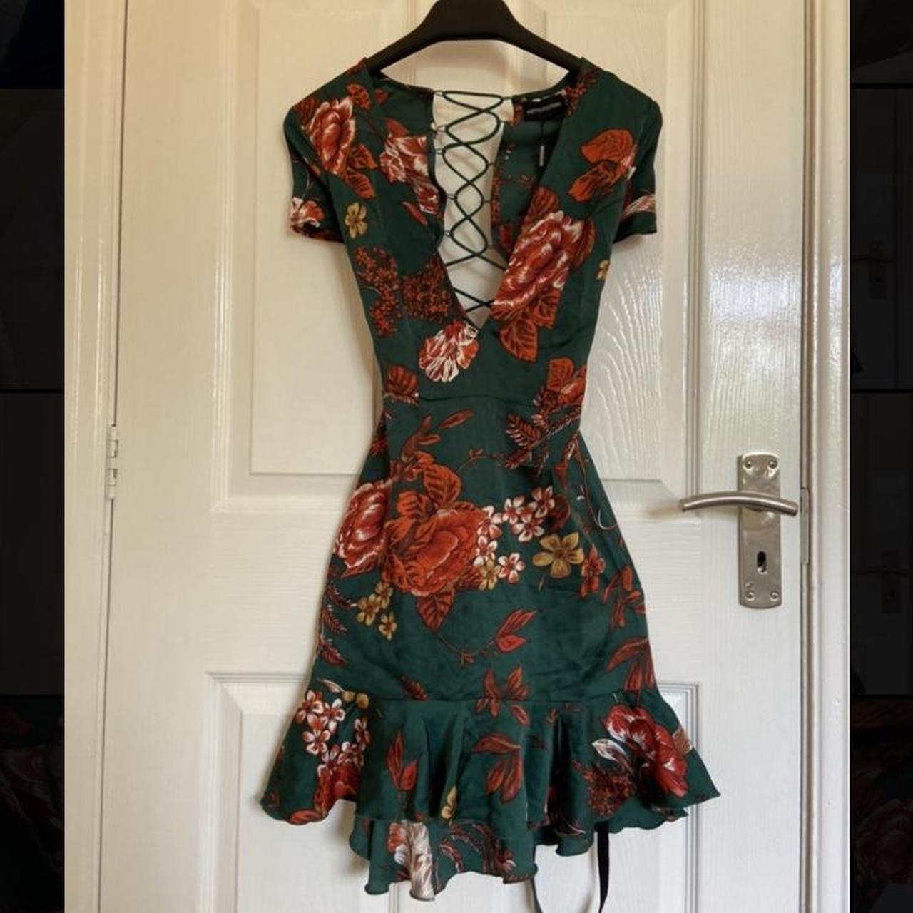 Brand new PLT floral open back dress Never worn tag... Depop