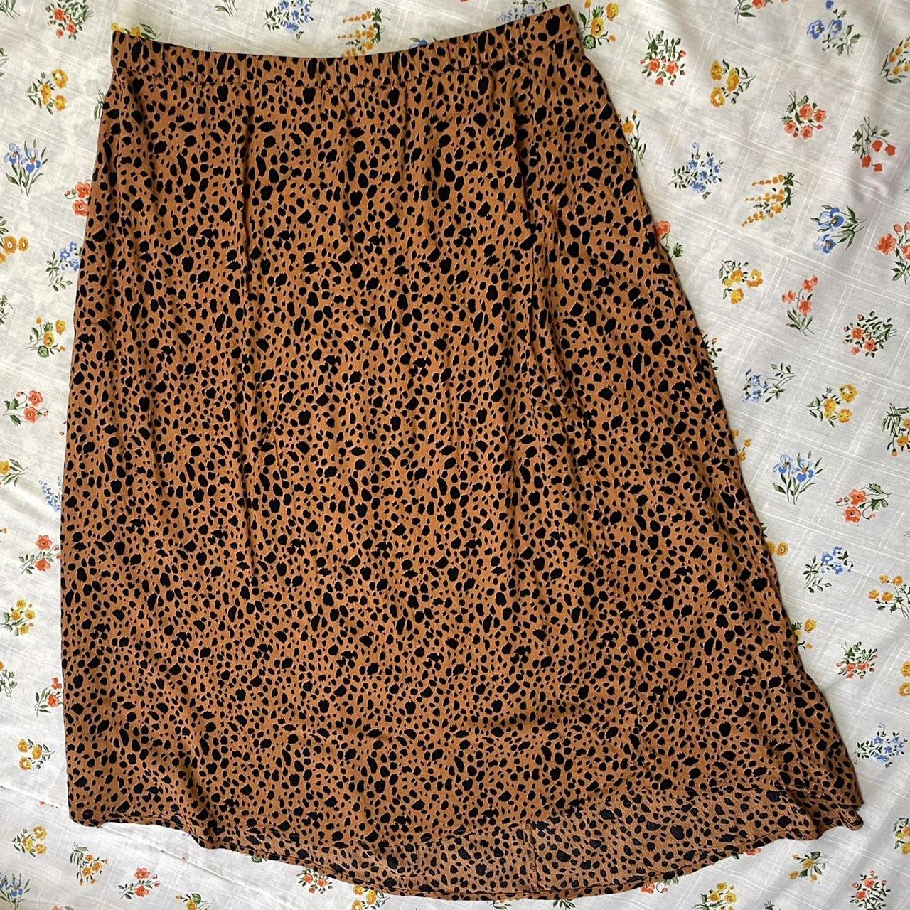 Gap Leopard print slightly asymmetrical midi skirt . Depop