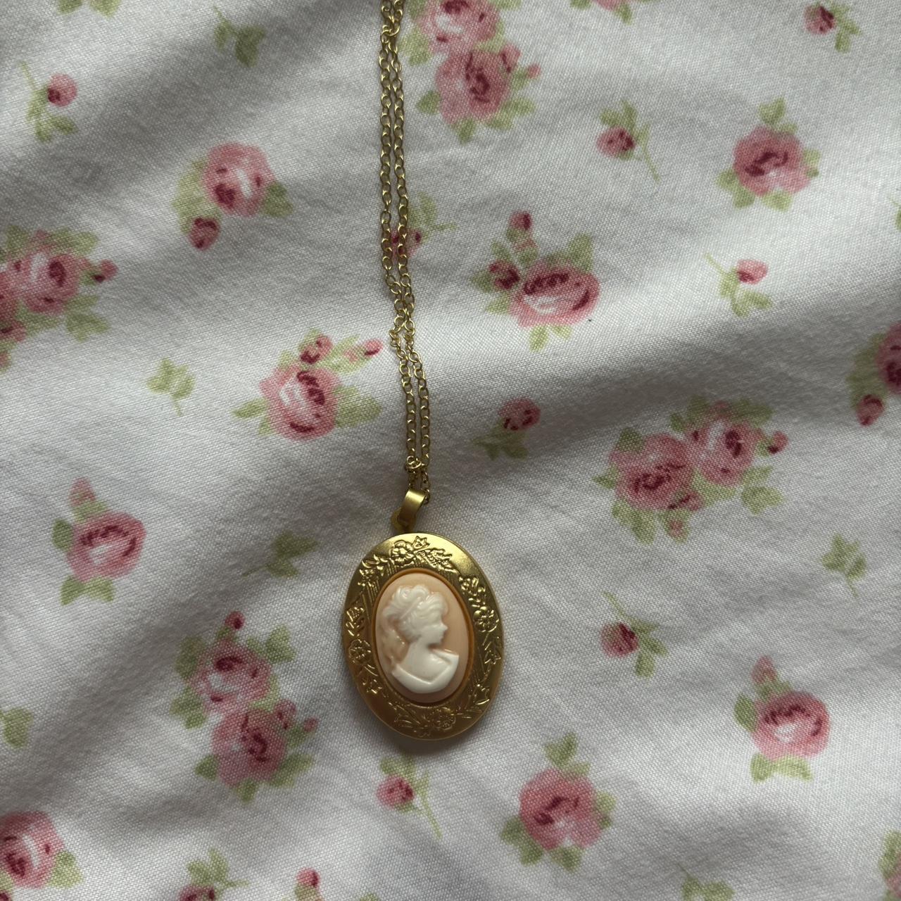 Brandy Melville gold vintage style locket necklace... Depop