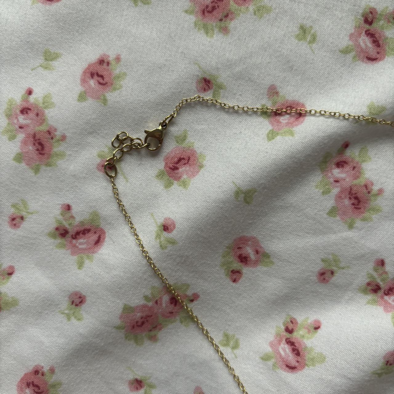 Brandy Melville gold vintage style locket necklace... Depop