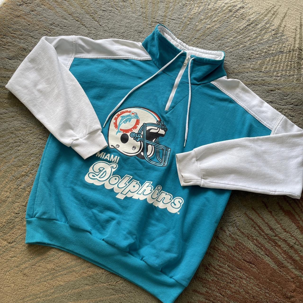 Vintage Miami dolphins hoodie . Nice faded blue - Depop