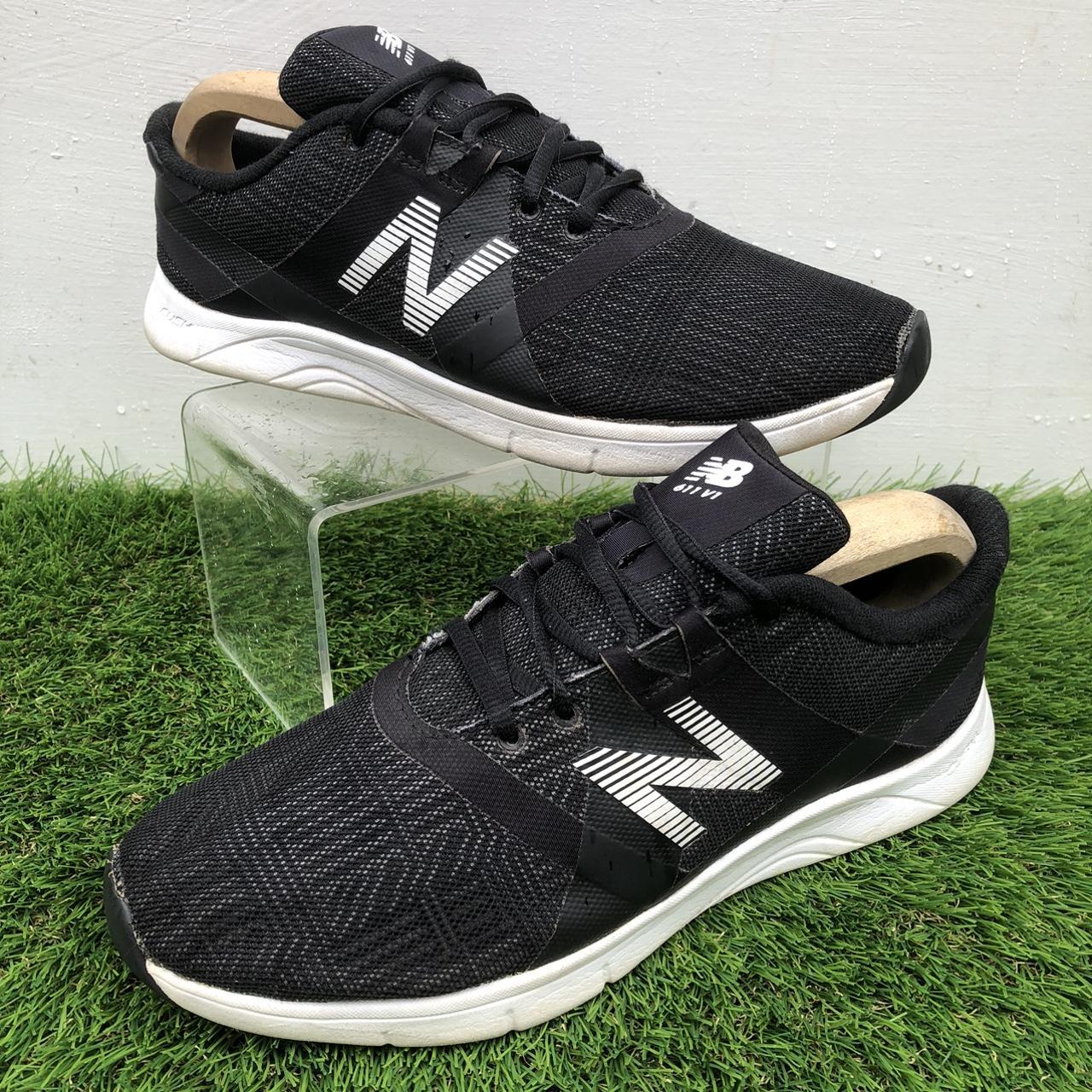 New Balance Women's Black and White Trainers Depop