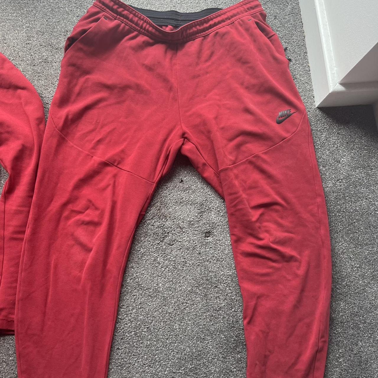 nike tech red suit
