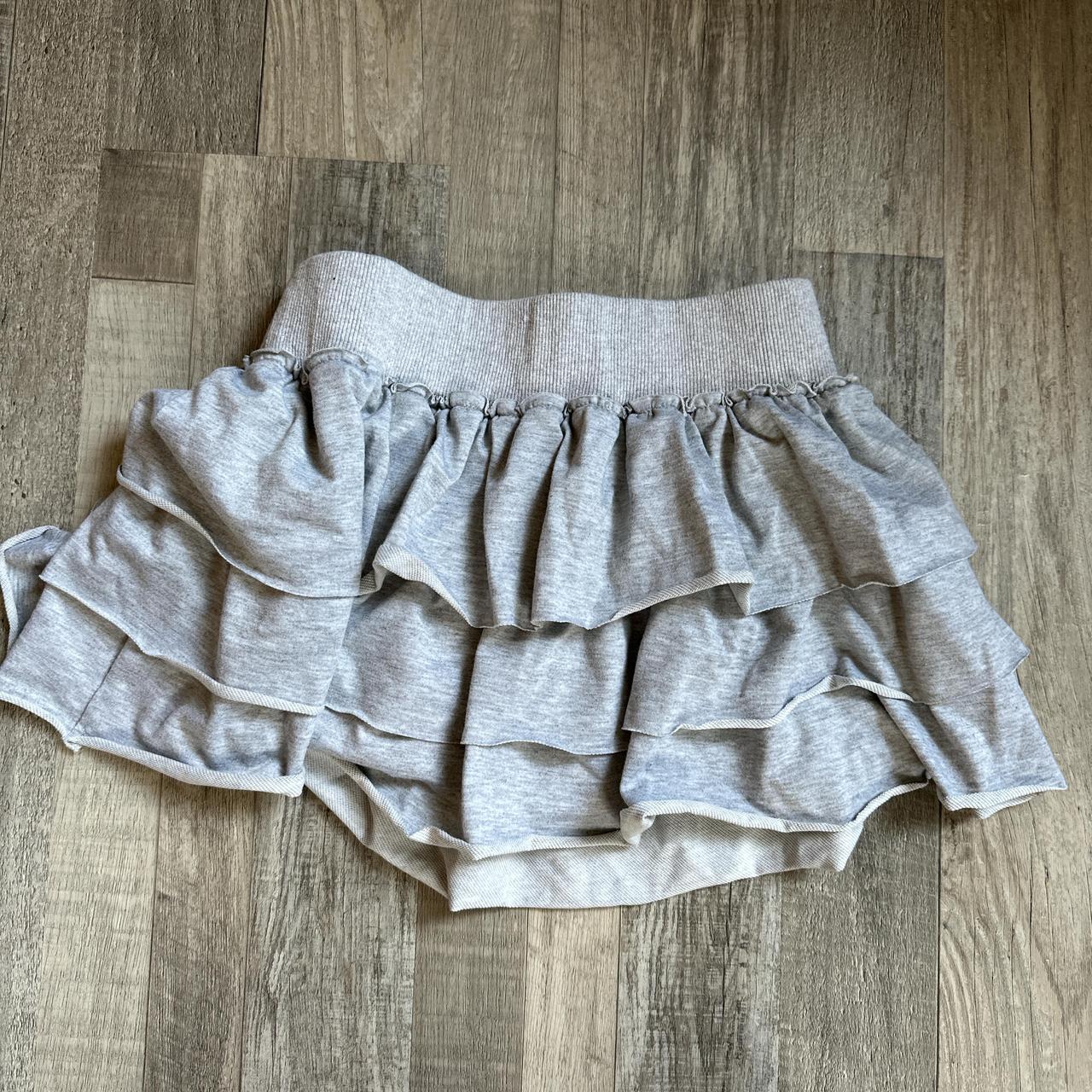 Gray ruffle skirt no tag never worn fits like an xs... - Depop