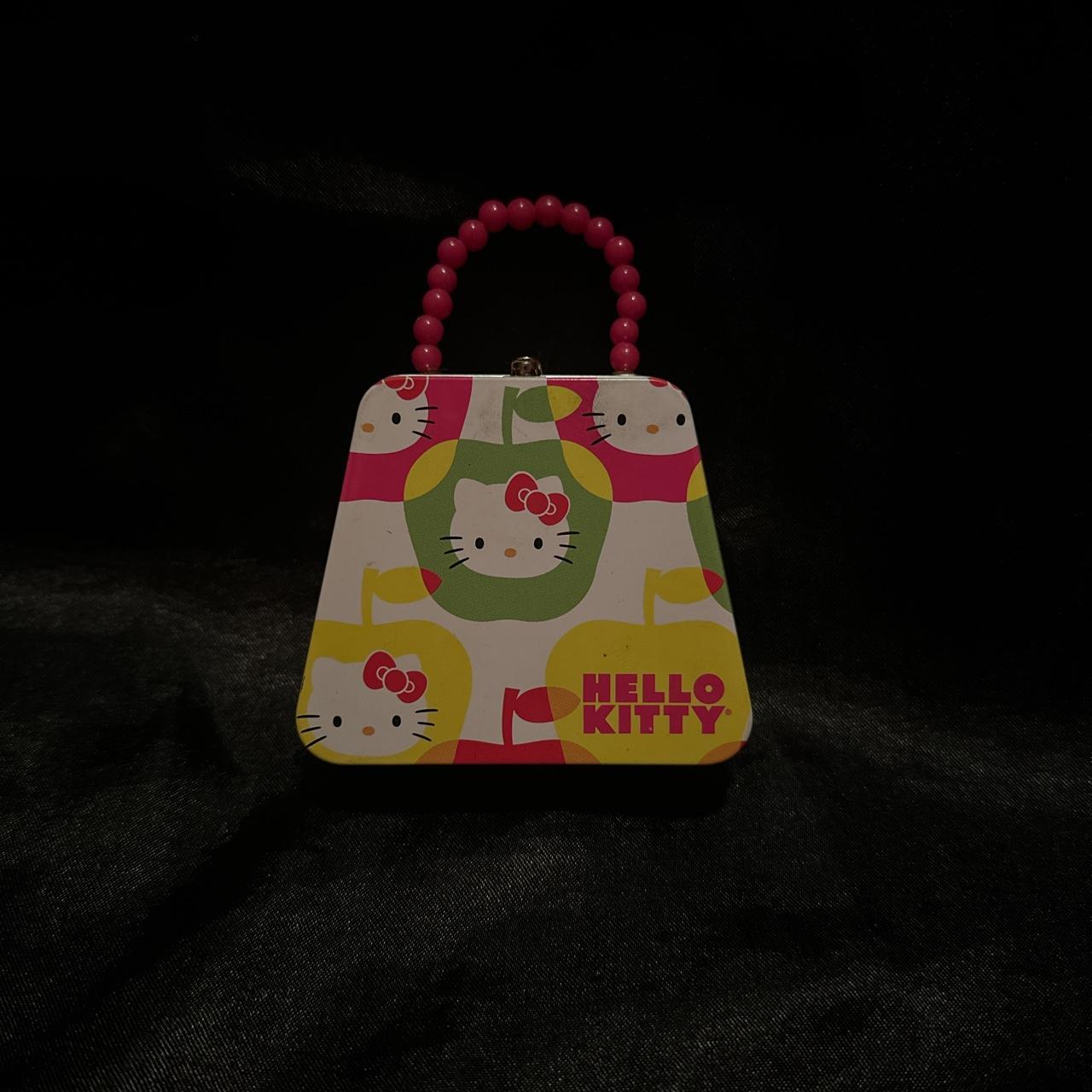 Hello kitty tin discount purse