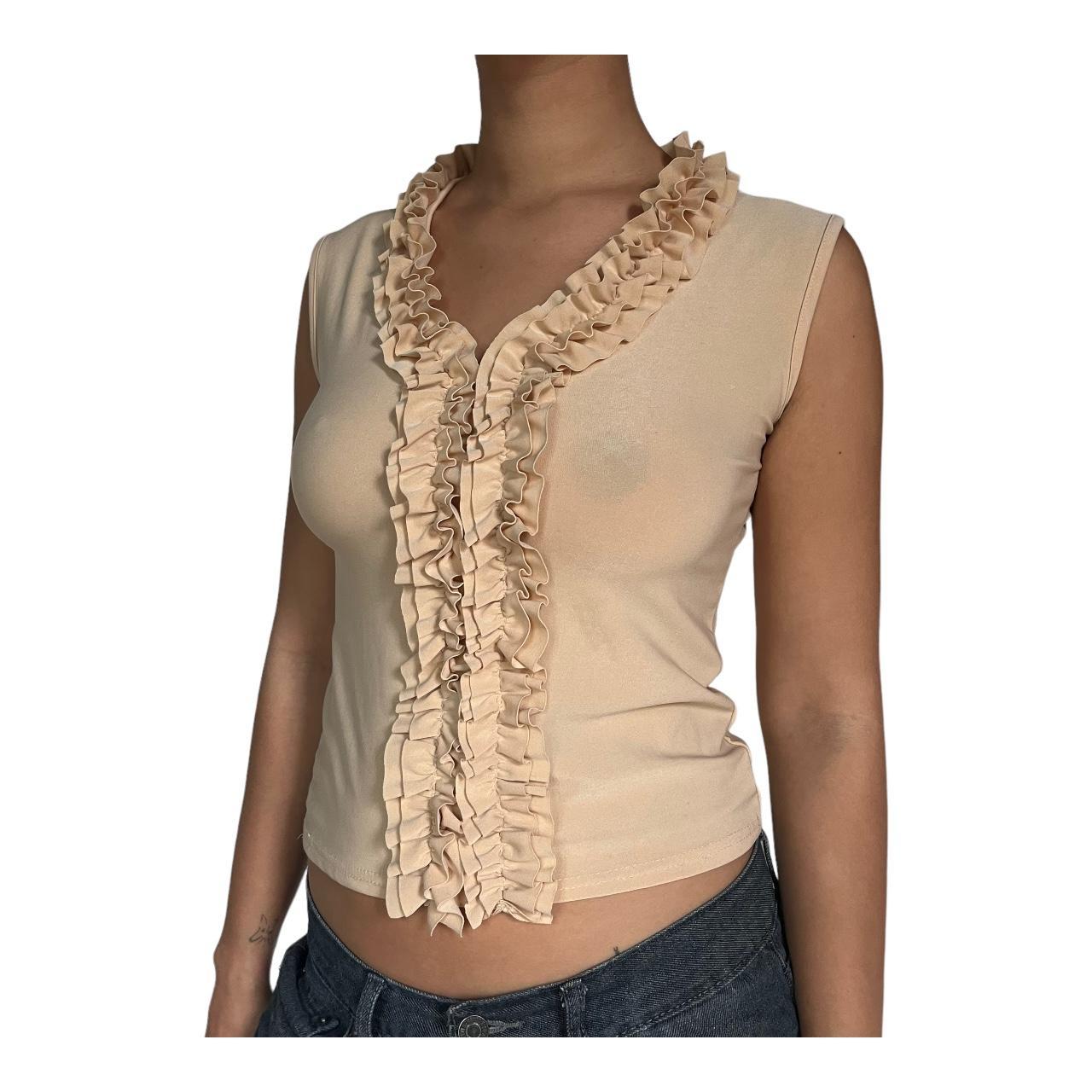 Beige tank top with ruffle ruching detail around the... - Depop